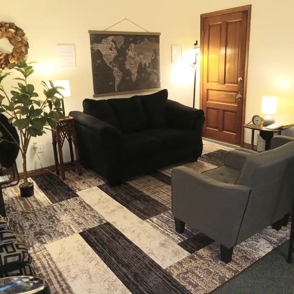 Aesthetic sofa in the clean lobby of Dr. Pete Cooper Clinic featuring comfort